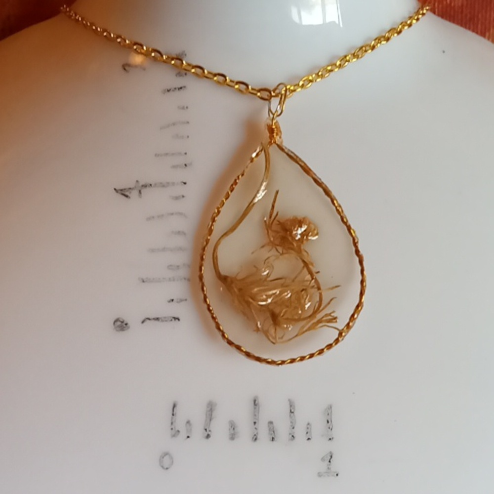 Floral necklace, amulet